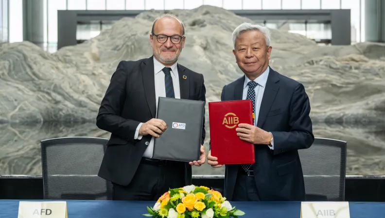 Remy Rioux CEO of AFD and Jin Liqun, AIIB President and Chair of the Board.